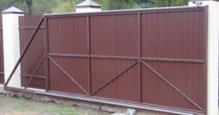Купить откатные ворота из профнастила Каспийск, цена от 1757 руб.