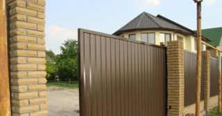 Купить откатные ворота из профнастила Каспийск, цена от 1757 руб.